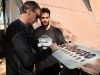 Tony signing Birdhouse sign